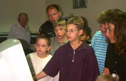 students looking at crime prevention site on computer