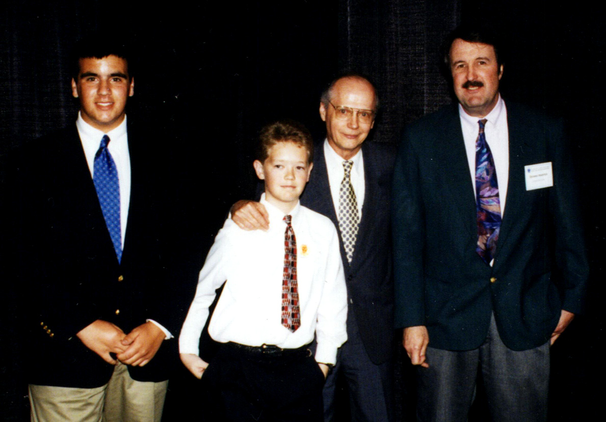 students Ryan and Graham meet Education Secretary Riley and Dr. Harper