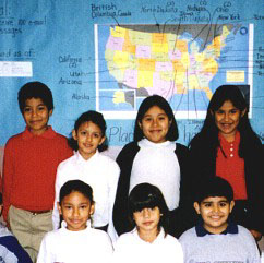kids in front of map